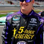 the infinite hero driver, wearing purple sunglasses, at Daytona Speedway